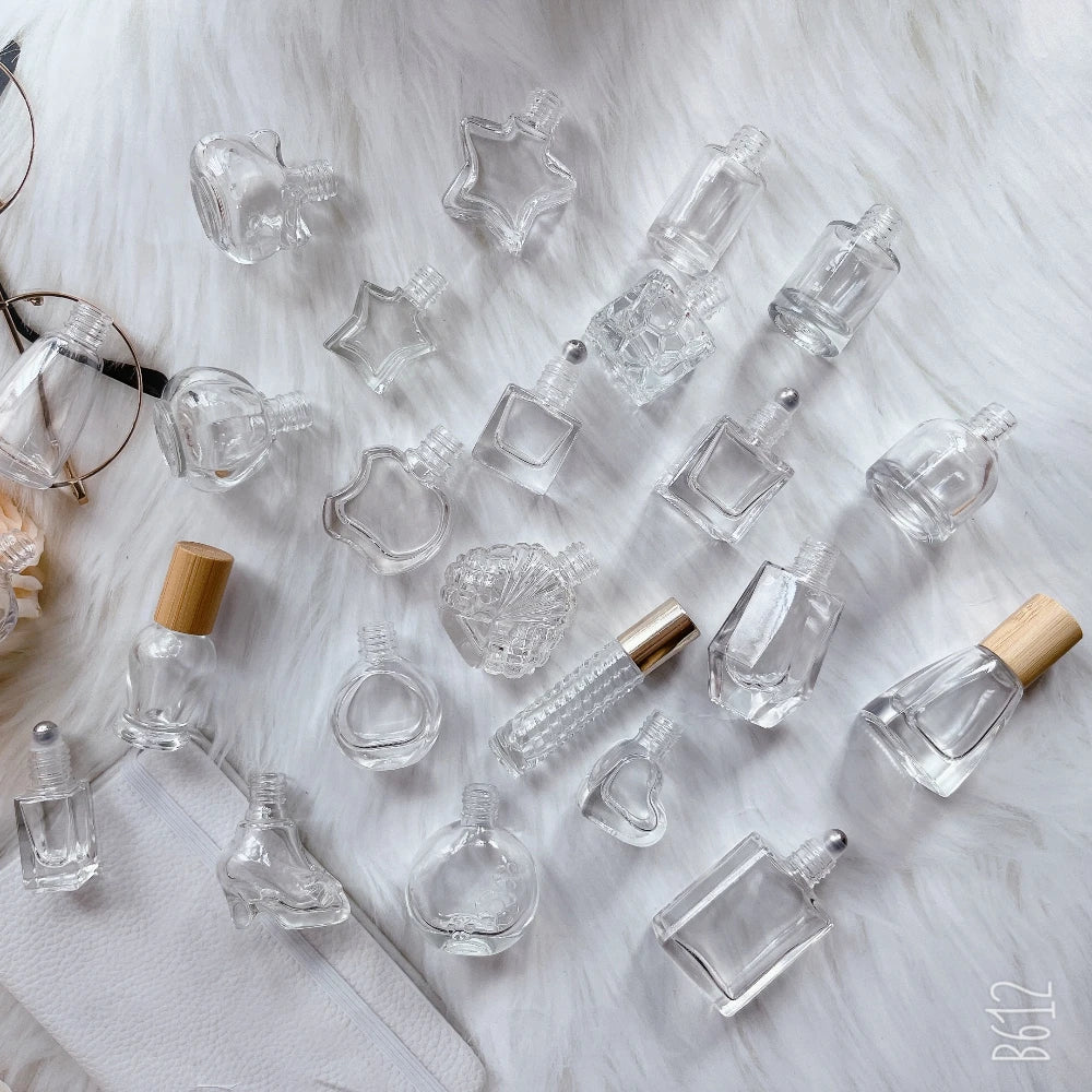 Wholesale Star Pentangle Swirl Square Rectangle Heart Bulb Shape Shaped clear Roller on Glass Bottle With Crystal Roller