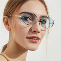STORY STY7150 UV400 Protection Retro Diamond Cut Oval Trimmed Sunglasses Fashion Small Frame Ocean Lens Rimless Sun Glasses