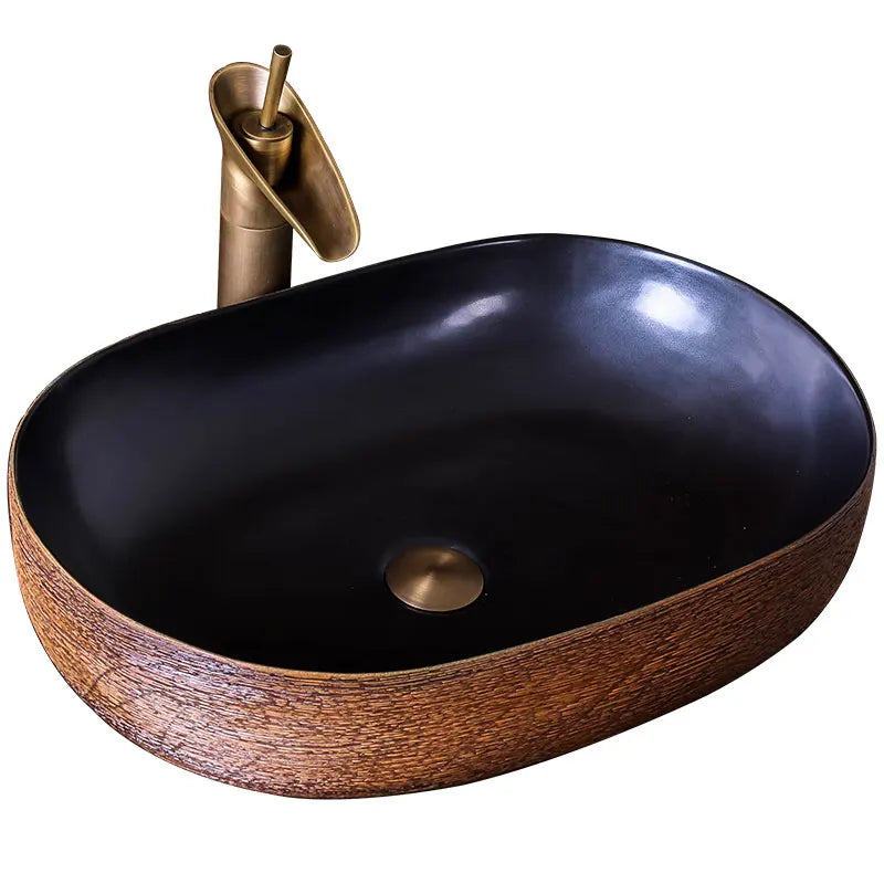 China Color Glazed Brown And Black Counter top Ceramic Oval Bathroom Face Washing Basin Porcelain Sink Basin