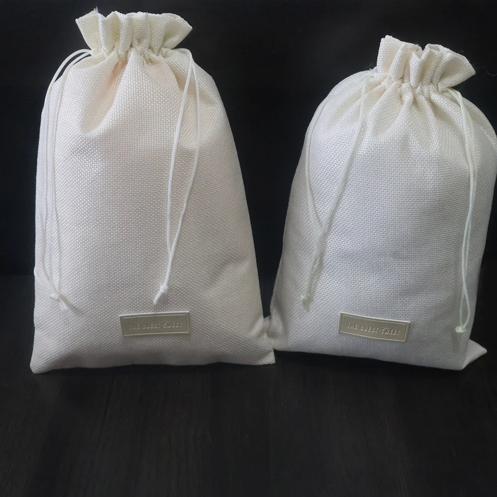 Custom Jute  Drawstring Lotion Pouch Linen Cosmetics Storage Bags With Custom Leather Tag