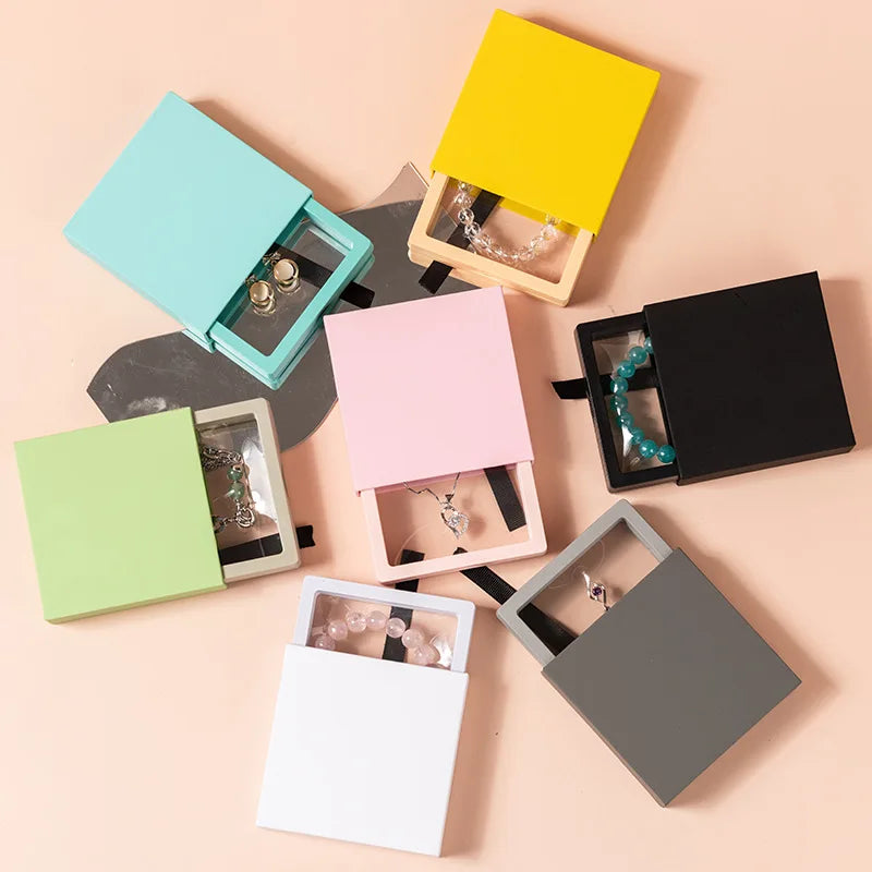 Wholesale Luxury Small Cardboard Jewelry Box with PE Suspended Film for Fashion Jewelry Display