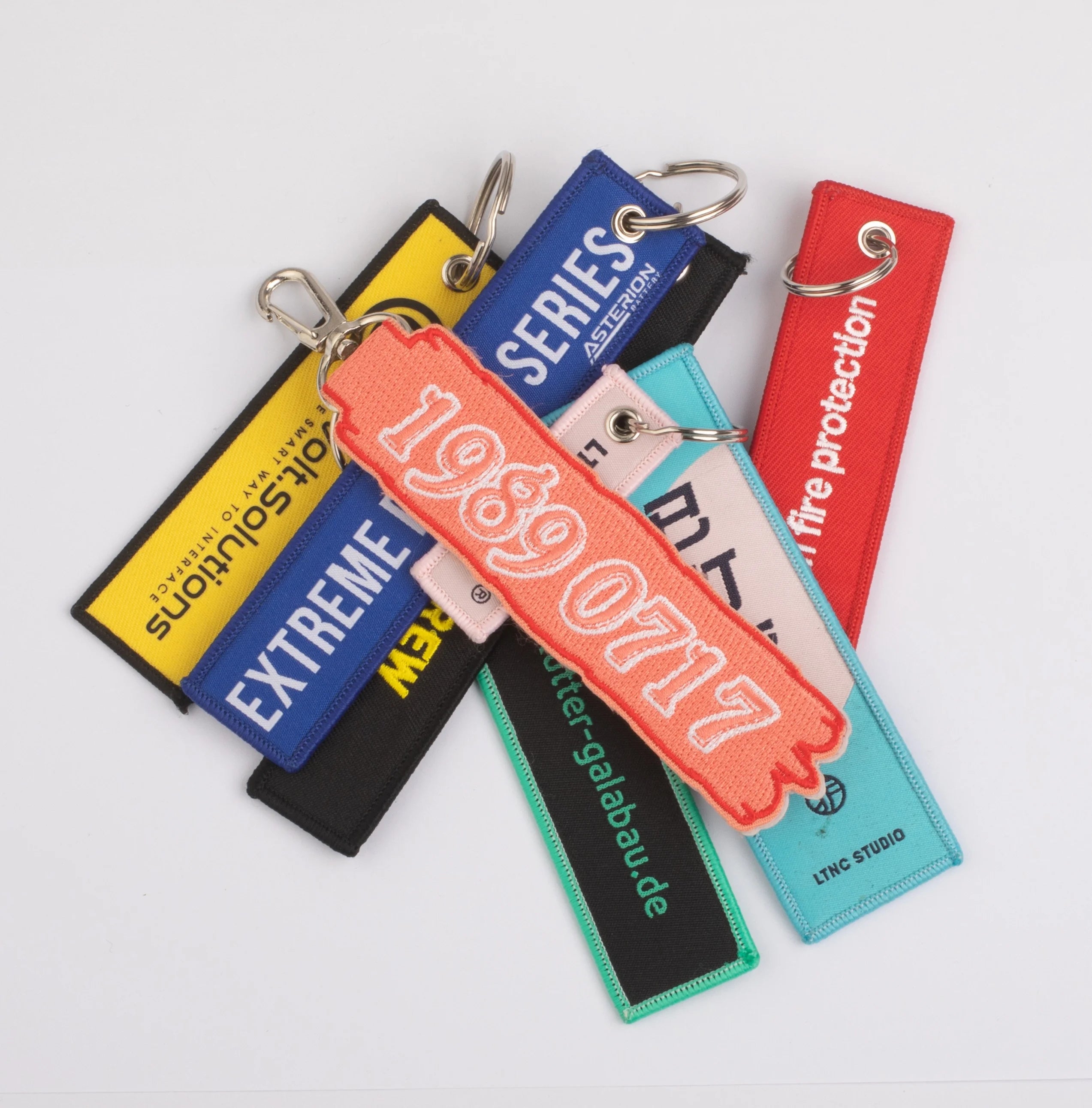 Custom Promotional Logo Anime Remove Before a Flight Crew Double Sided Woven Fabric Embroidery Embroidered Key Jet Tag Keychain
