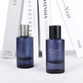 Custom Color 50ml Fancy Style Dark Blue Men Empty Luxury Glass Perfume Bottle with Spray Cap Screen Printing Pump Sprayer