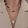 Handmade Beaded White Shell Oval Pendant Necklace Gold Plated Twist Chain Double Layer Titanium Steel Necklace for Women