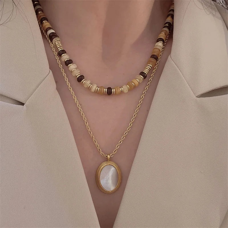 Handmade Beaded White Shell Oval Pendant Necklace Gold Plated Twist Chain Double Layer Titanium Steel Necklace for Women