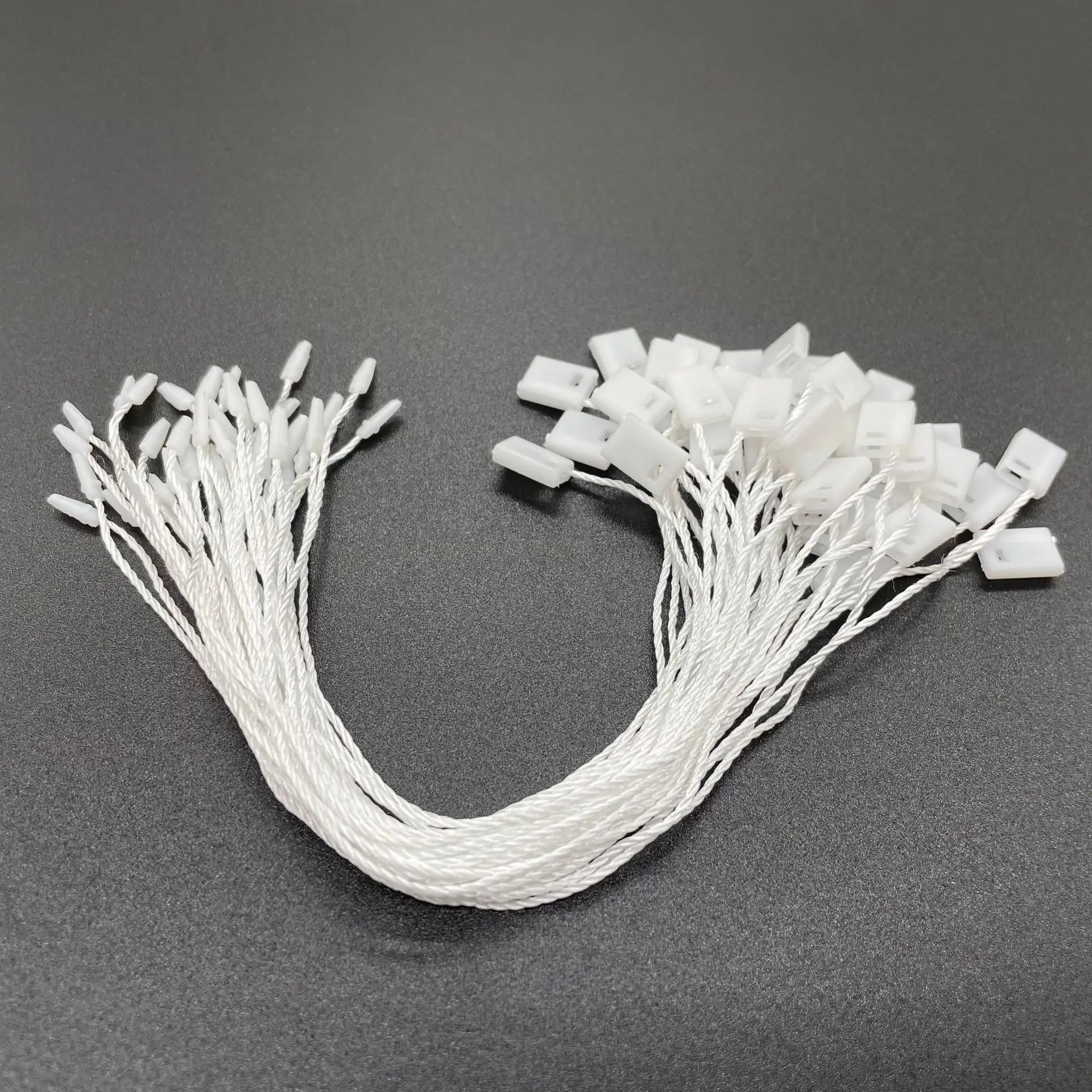 High Quality Snap Lock Bullet hang Tag Clothes Accessories hang Tag Rope