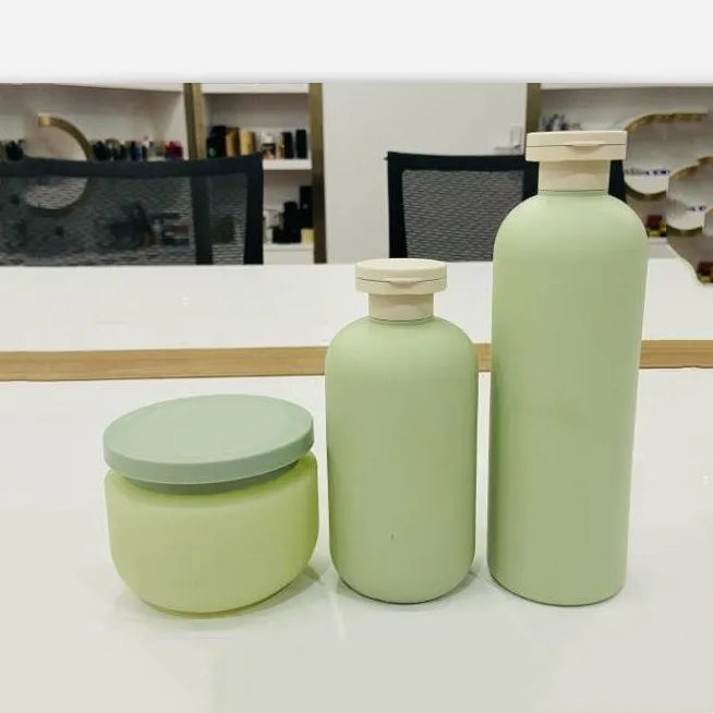 Wholesale 100ml 200ml 300ml 500ml HDPE Matte Green Skincare Packaging Oil Shampoo Shower Gel Lotion Plastic Pump Bottle Set