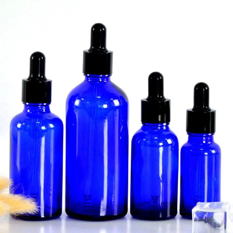 Luxury Blue Glass Essential Oil Dropper Bottle 30ml 50ml 100ml with Spray Cap for Cosmetic Eye Drops and Skin Care Serums
