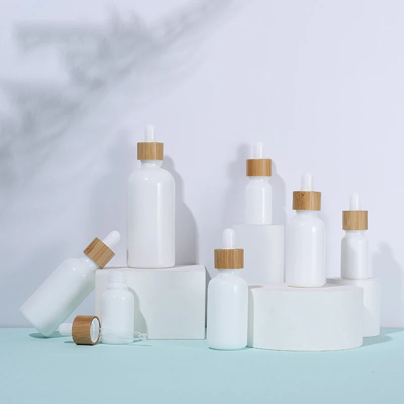 White Porcelain Cylinder Shape Essential Oils Bottle 10/15/30/50/100ml Capacity Bamboo Dropper Glass Bottles Product Category