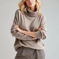 Women's Soft Oversized Cashmere Turtleneck Sweater Winter Knit Pullover with Front Logo Casual Style