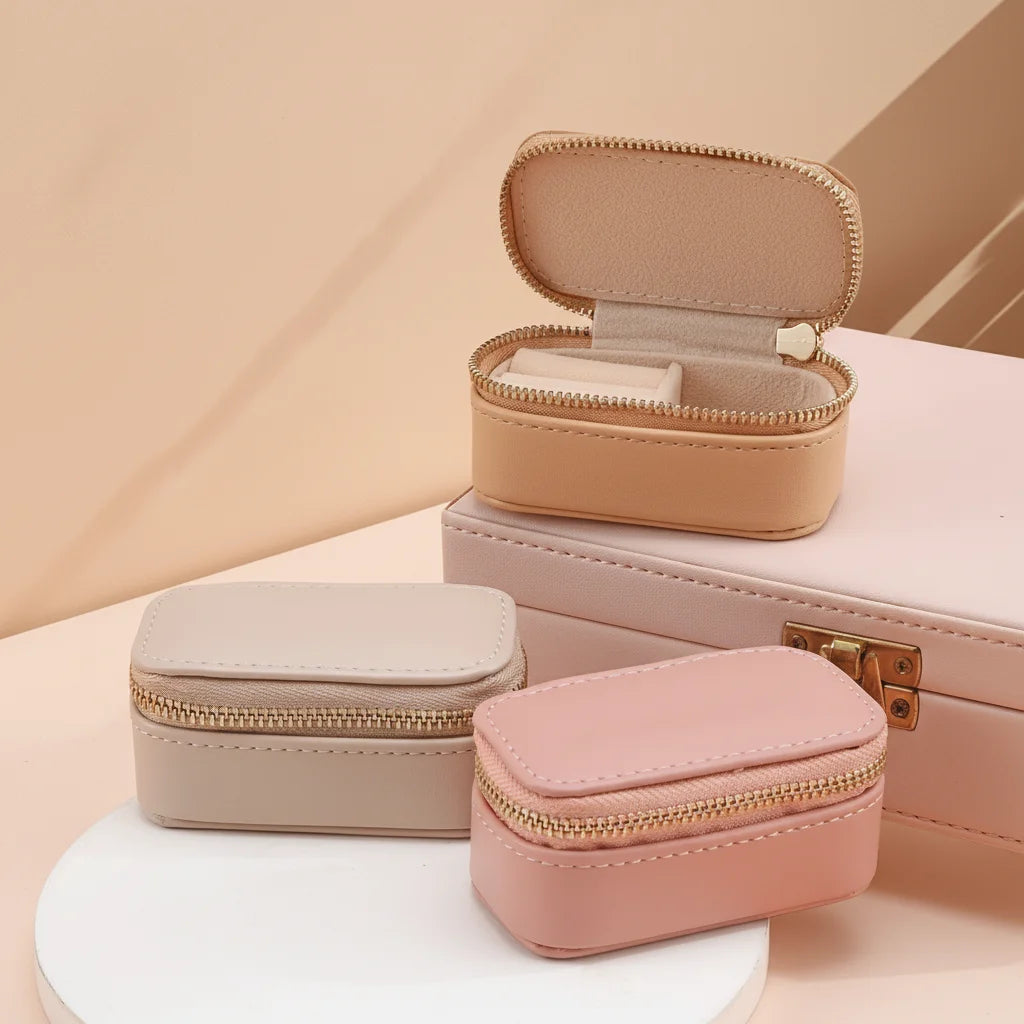2025 Portable Luxury Premium Travel PU Leather Mini Jewelry Box with Smooth Zipper for Earrings and Rings