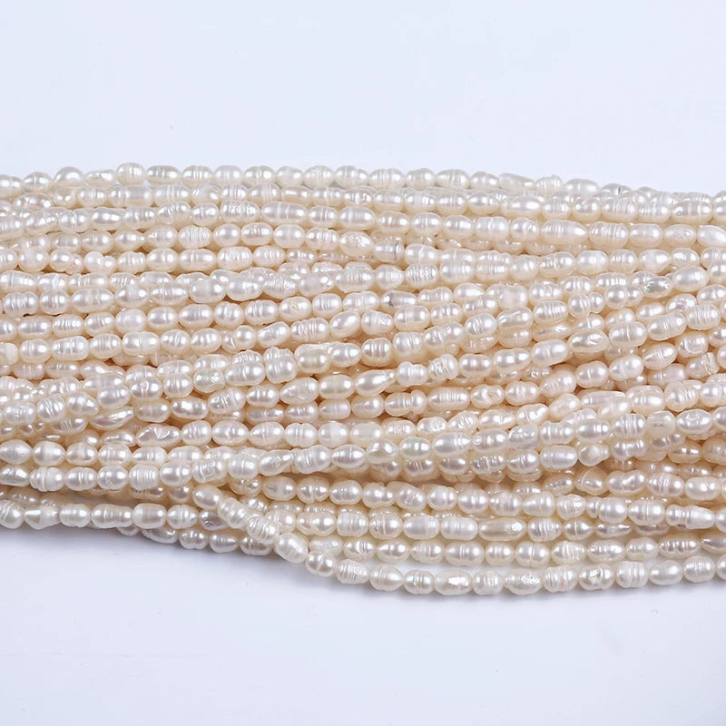 Wholesale Freshwater Bulk Freshwater Beads Rice Shape Strand Pearl