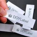 High Quality Custom Silicone Letter Name Logo Sew on Satin Woven Garment Labels for Clothing