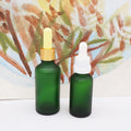 20ml 30ml Dark Green Cosmetic Face Essential Oil Serum Bottle Cylinder Glass Dropper Bottle with Paper Box