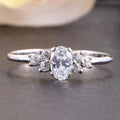 Huitan OEM Simple Style White/Blue Oval Design Crystal Cubic Zirconia Silver Plated Finger Rings for Women CZ Engagement Rings