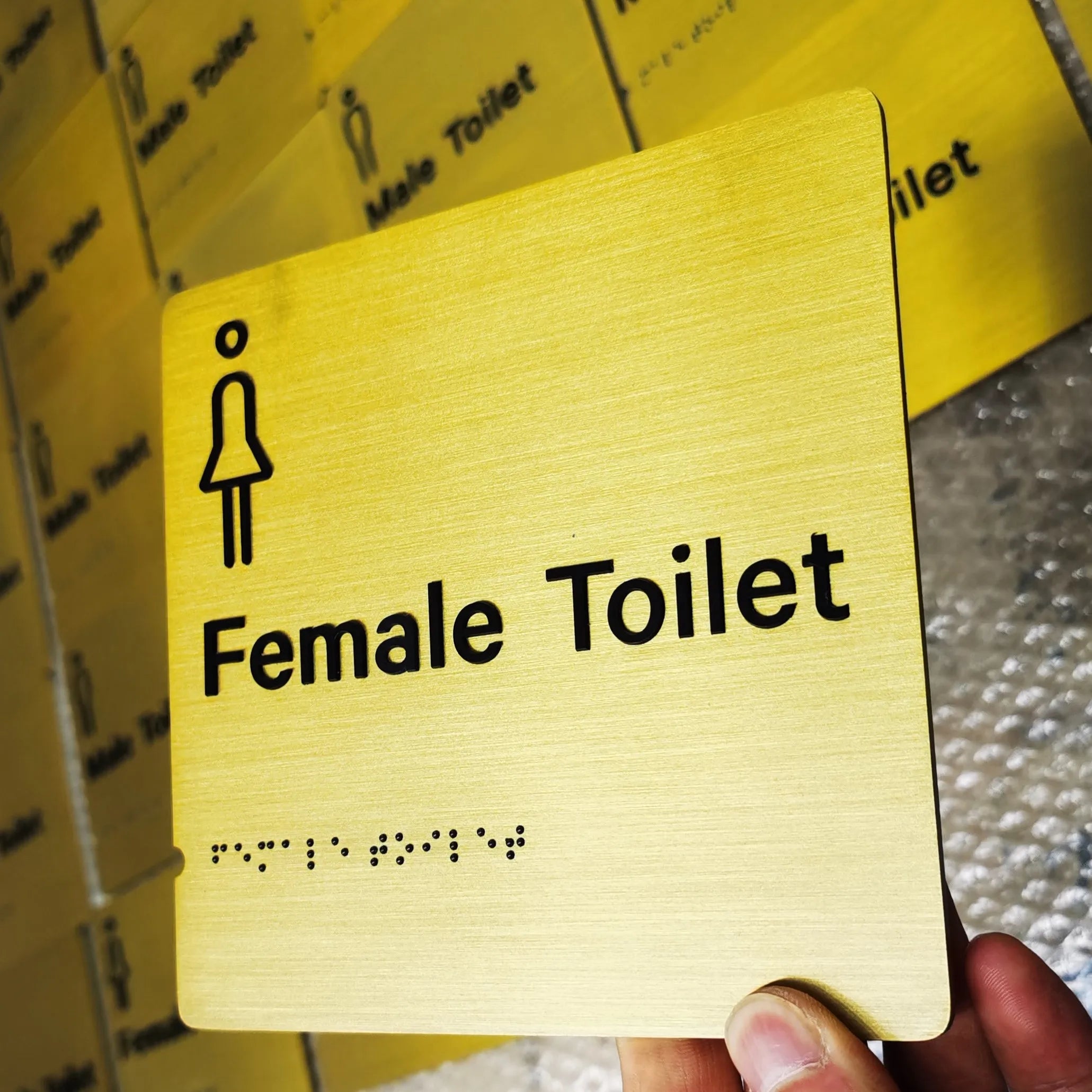 Restroom Metal Ada Sign with Man Women Compliant Raised Tactile Text