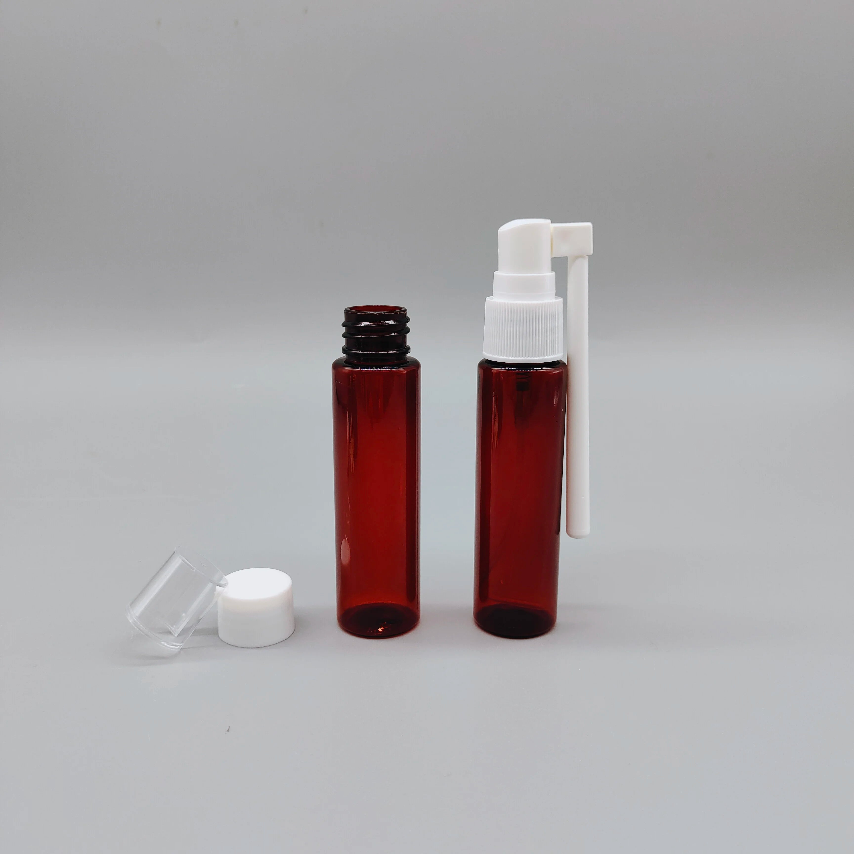 Wholesale 35ml Plastic PET Flat Shoulder Nasal Spray Bottle with Pump Sprayer for Medicine Liquid Packaging