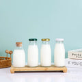 Top Selling 200ml 250ml 500ml 1000ml Glass Beverage Bottles Screw Cap Screen Printing Milk Juice Wholesale Empty Containers