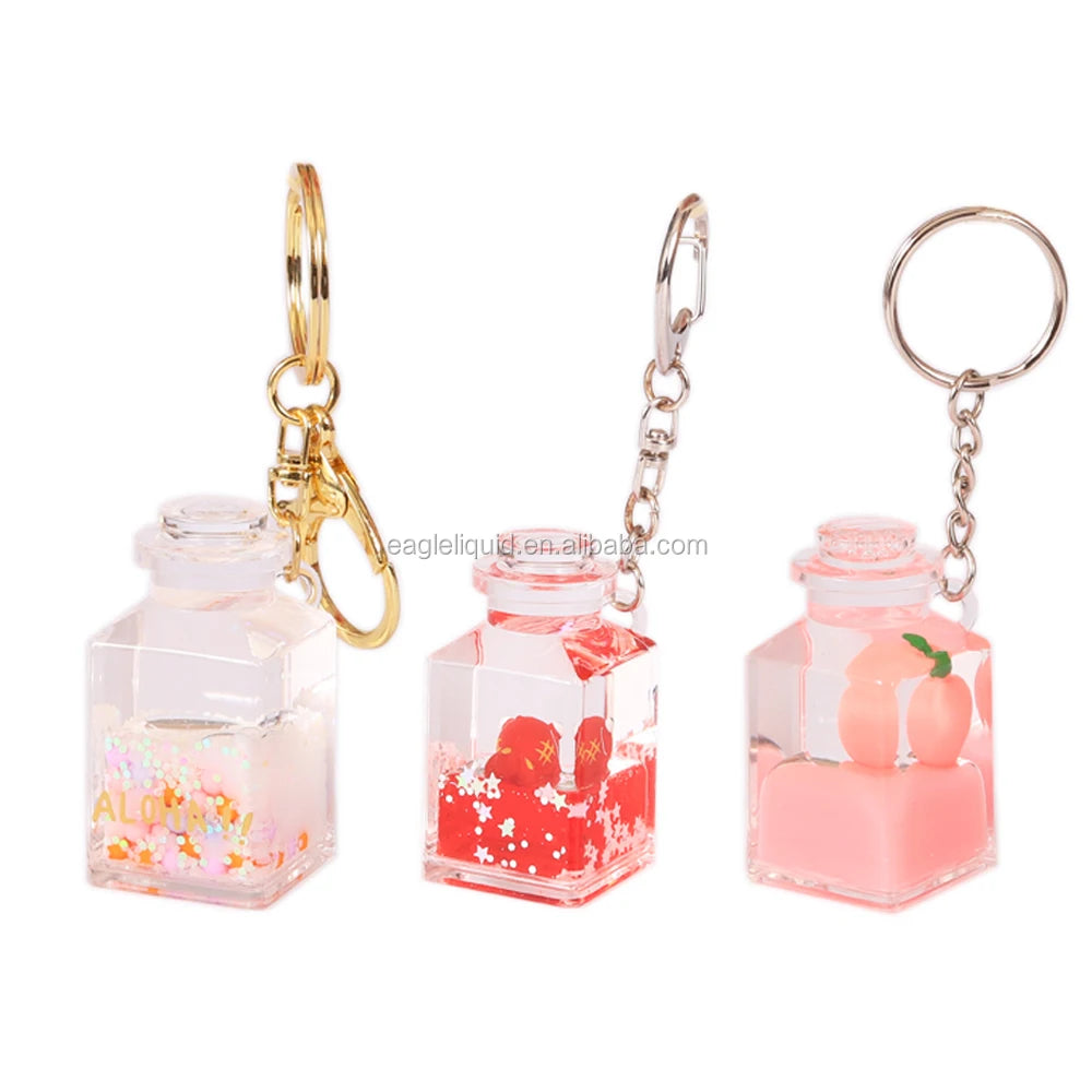 Hot Selling Fancy Girls Gifts Custom Crystal Keychain Aqua Cute Floater Keyholder Bottle Shape Acrylic Keychain