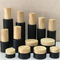 Cosmetics Frosted Glass Bottle Black Perfume Fine Mist Spray Bottle Black Essence Oil Lotion Pump Bottle With Wood Grain Cover