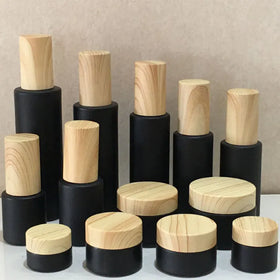 Cosmetics Frosted Glass Bottle Black Perfume Fine Mist Spray Bottle Black Essence Oil Lotion Pump Bottle With Wood Grain Cover