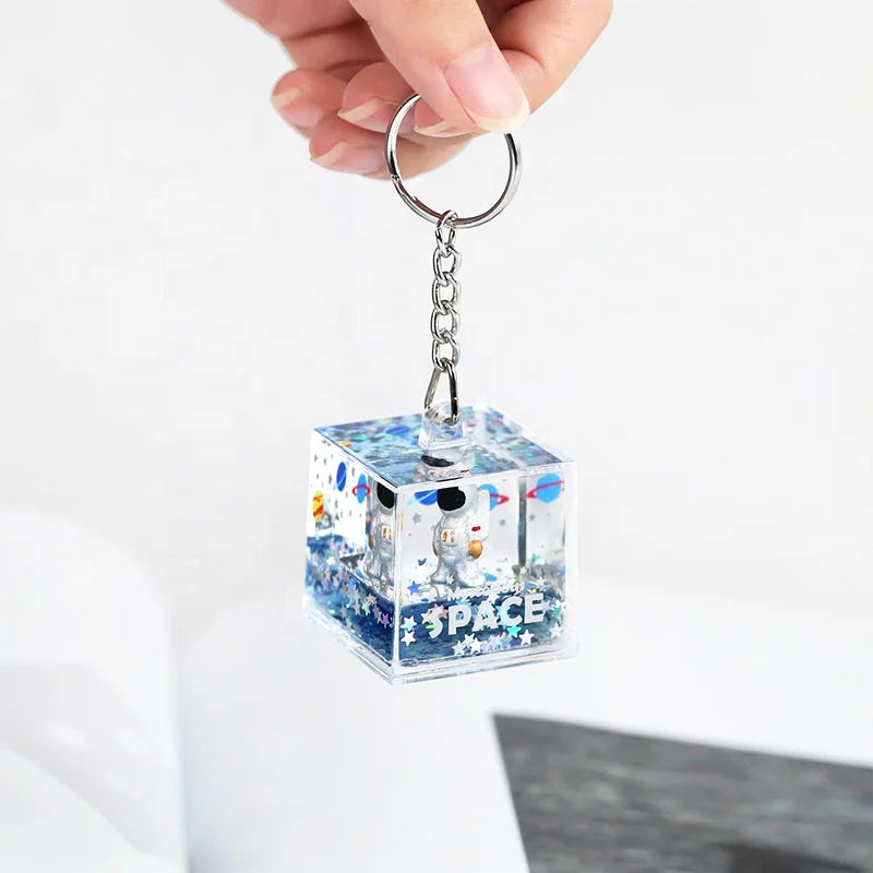 2021 Nrew Design Mysterious Space Astronaut Keychain Popular Acrylic Square Shaped Quicksand Oil Water Liquid Spaceman Keychains