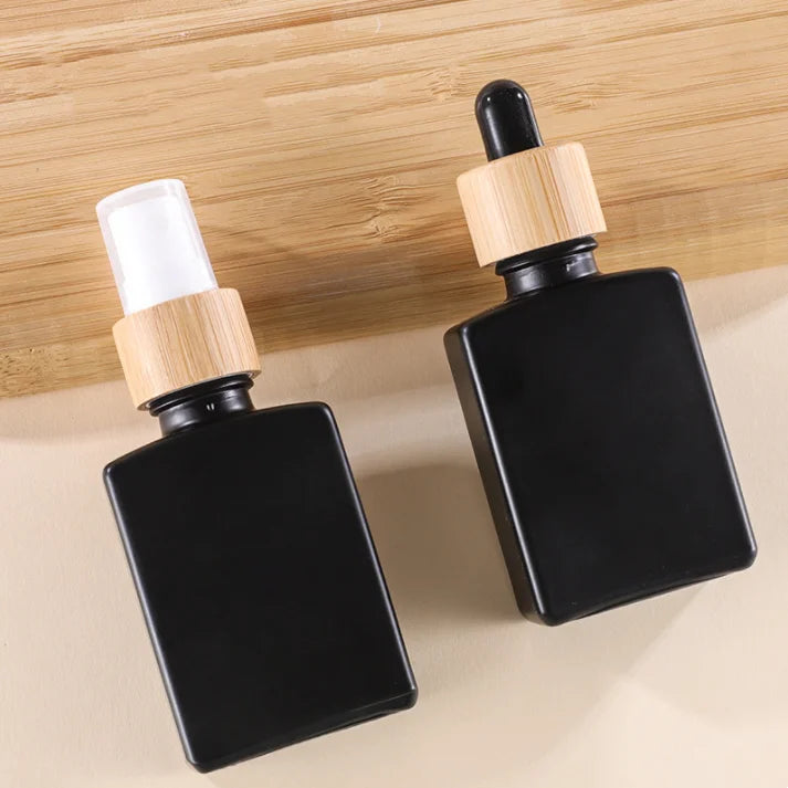 Daily Women Facial Care Essential Oil Cosmetic Packaging 30ml Frosted Matte Black Bamboo Spray Dropper Glass Bottle