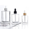 Transparent Square Oil Glass Bottle with Pump Sprayer 15ml 30ml 50ml 100ml Capacities in Stock