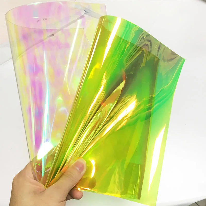 Thickness 0.7-0.8mm Oil-proof and Smooth and Shiny Colored Transparent Illusion PVC for Making Raincoats and Rain Shoes PVC Film