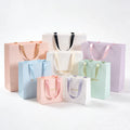 Custom Designed Luxury Ribbon Gift Cardboard Paper Bag Digital Magnetic Closure Clothing Craft Packaging Shops