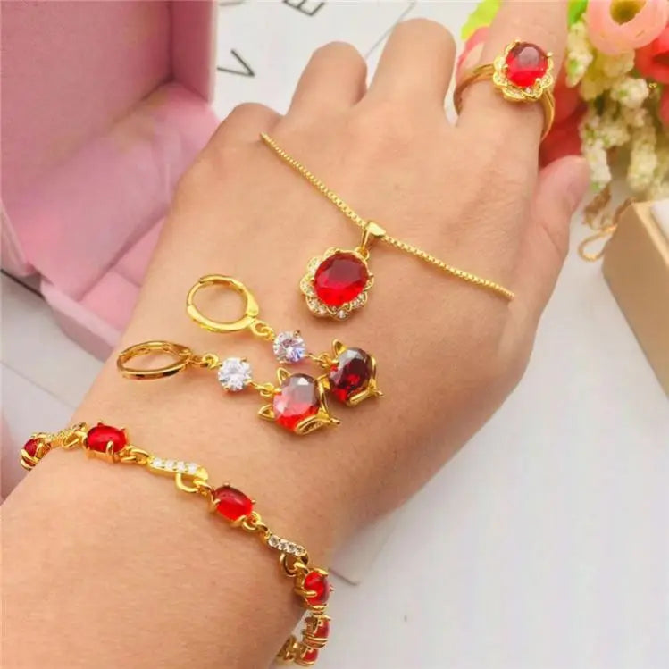 Dubai Gold Gold Jewelry Brass Gilded Jewelry Red Gemstone Four Piece Set Women'S Fashion Accessories Wholesale