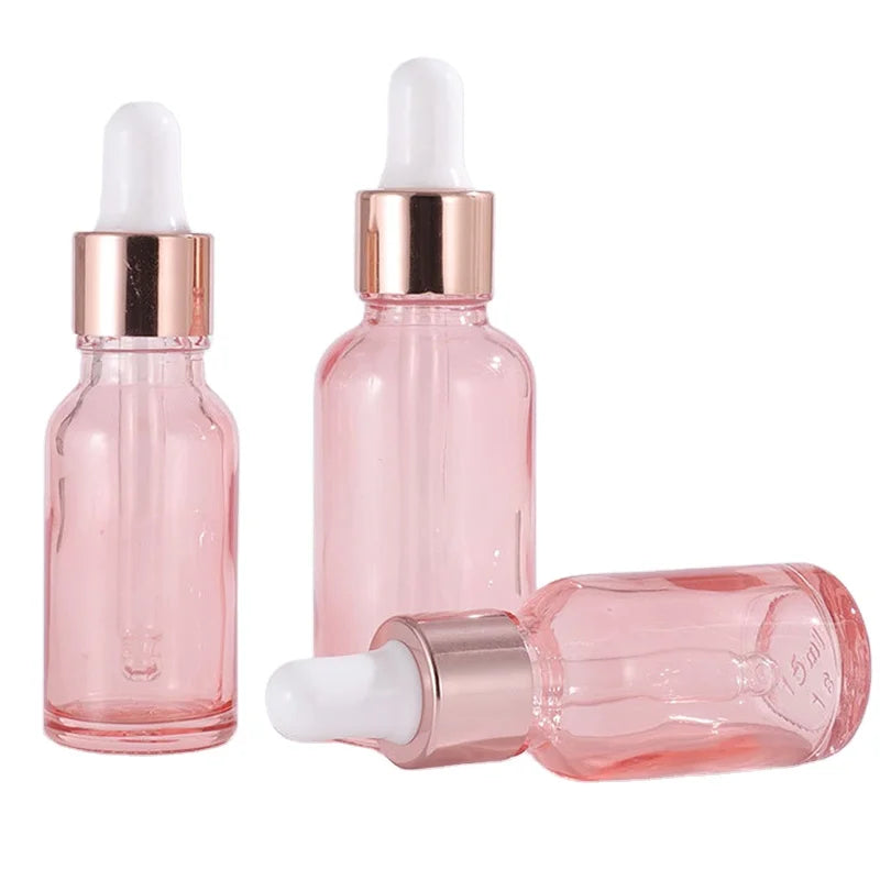 Hot Sale Essential Oil Bottles Pink Dropper Bottle Liquid Hair Body Oil Bottle Glass Customized 30ml With Rose Gold Lid Cosmetic