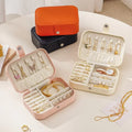Hot Sale Small Portable Leather Jewelry Case with Buckle Girls Ear Stud Box Organizer for Travel and Storage