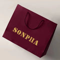 Wholesale Custom OEM Logo Printing Eco-Friendly Recyclable Maroon Coated Paper Bags with Gold Ribbon Handles for Shoes Clothing