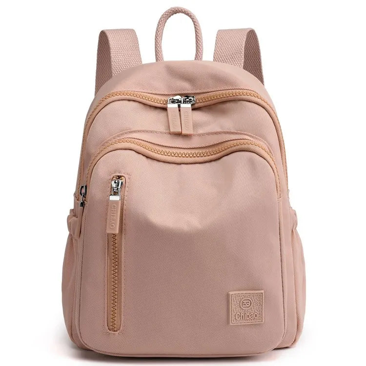 2025 New Fashion Large Capacity Anti-Theft Water Resistant Women's Portable Leisure Travel Backpack with Simple School Style