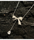 Dancing Light Tassel Necklace Bow Knot with Waterdrop CZ 925 Sterling Silver Elegant Pendant Movable Sparkling Jewelry