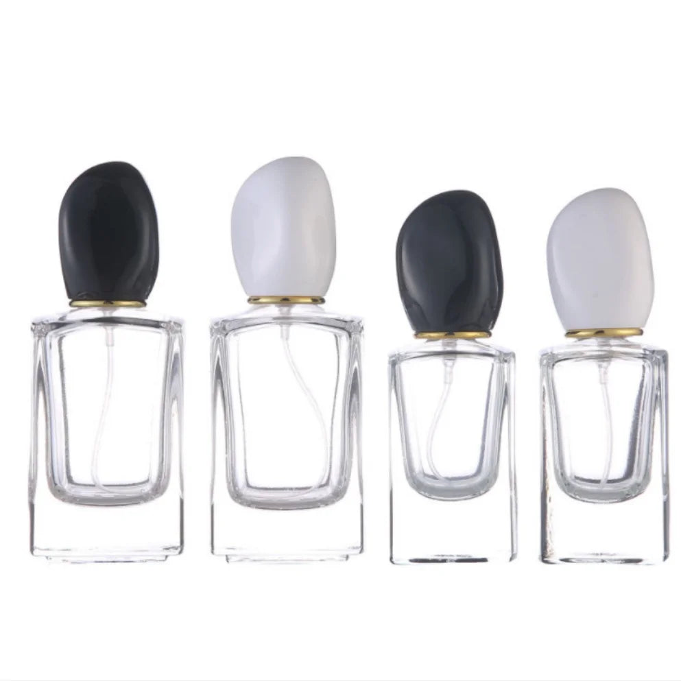 Wholesale Custom Logo Engraving 30ml 50ml Empty Perfume Glass Bottles with Crown Cap