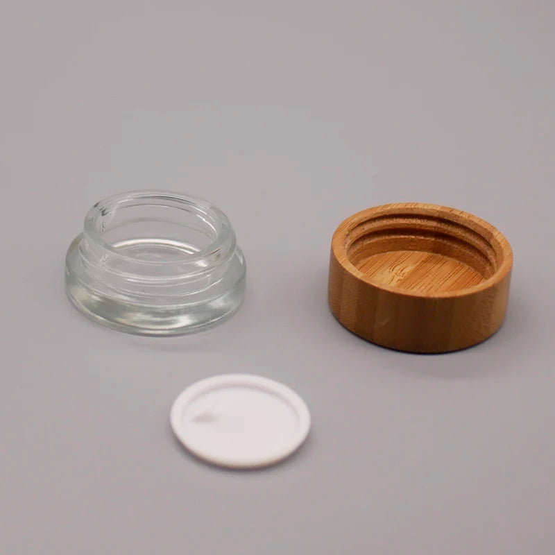 Round Transparent Glass Skin Care Products Container Eco Friendly Small  5g 50 Ml Glass Cosmetic Jar with Bamboo Lid for Eye Cre