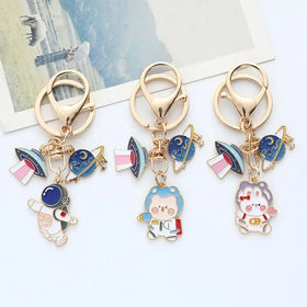 Wholesale Enamel Metal Key Chains Cartoon Spaceman Astronaut Keychain Planet Rocket Keychain for Kids Space Fans Souvenirs Gifts