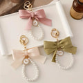 Luck Luxury Bow Keychain Pearl Wrist Strap Cute Bowknot Cheer Key Rings Bag Charm Pendent Bow Pearl Keychain Women Key Chains