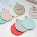 Zonyin Wholesale Cheap Pocket Mirror Small Round Makeup Mirror Custom Logo Pu Leather Cosmetic Metal Mirror with Hanging Hole