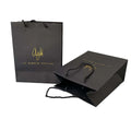 Custom Gold Stamped Printed Luxury Black Paper Jewelry Cosmetic Shoes Clothing Packaging Bag Gift Shopping Paper Bag With Handle