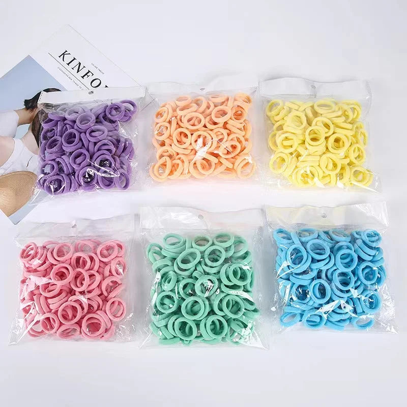 Wholesale 100pcs Simple Design Nylon Seamless Strong Elastic Hair Ties Rope Candy Solid Color Scrunchies for Kids Girls