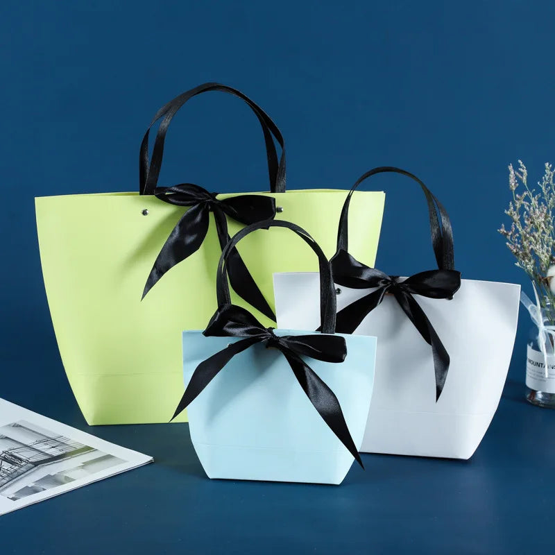 Fashion Design Special Boat Shape Hand-held Paper Bag Custom Colorful Printing logo Paper Shopping Packing Bag
