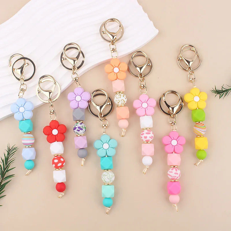 Cute Boho Flower Shape Silicone Keychain with Tassel Pendant and Colorful Beads Creative Metal Sleutelhanger