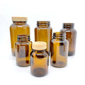 Wholesale Empty Amber Glass Capsule Bottles Heavy Glass Wide Mouth Packer Medicine Bottles With Caps Liner Powder Jar