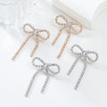 2024 Fashion Jewelry Trendy Colored Full Diamond Earrings Earrings Super Flash Claw Chain Bow Tassel Dangle Rhinestone Earrings MegaBDM
