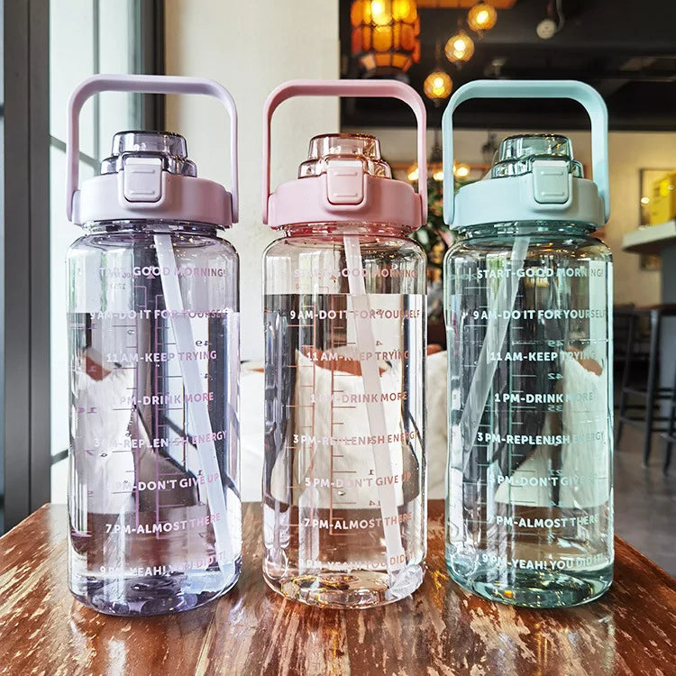 2024 Transparent Plastic Motivational 64 oz Clear Sports Water Bottle with Time Marker and Straw