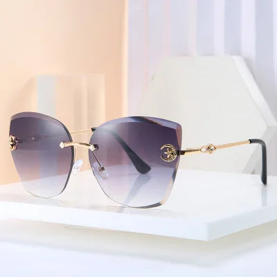 2025 Trendy Luxury High Quality Designer Womens Oversized Cat Eye Rimless Frames Shades Sunglasses Women