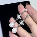 Silver Needle Anti-Allergy Design White Freshwater AAAA Grade Platinum Plated Rice Shape Water Droplet Pearl Earrings for Women